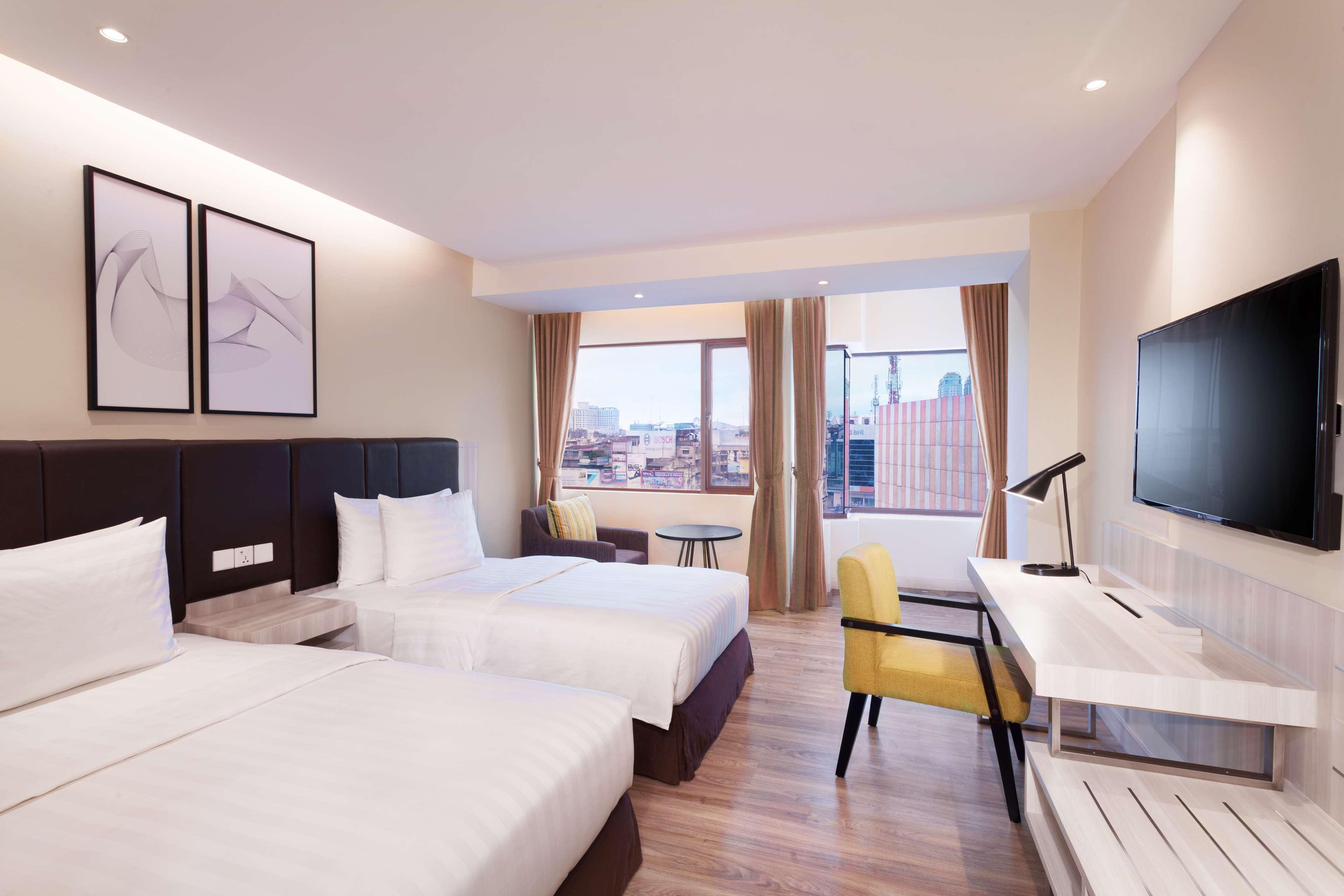 Aiho Hotel Medan Pokoj fotografie